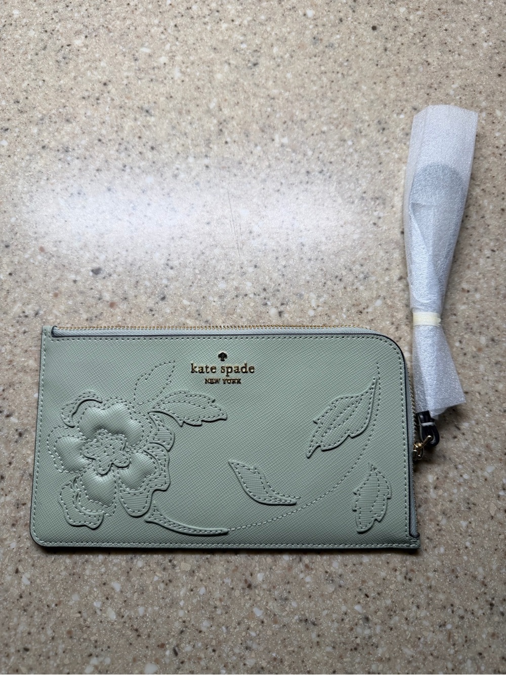Kate Spade pale mint floral zip clutch